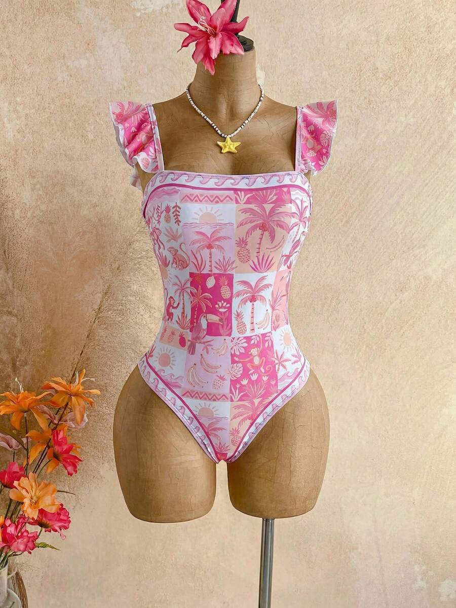 Traje de baño de una pieza con estampado tropical rosa y blanco en un maniquí.