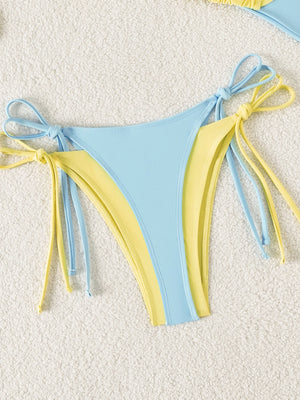 Parte inferior del bikini con doble capa en celeste y amarillo con lazos ajustables