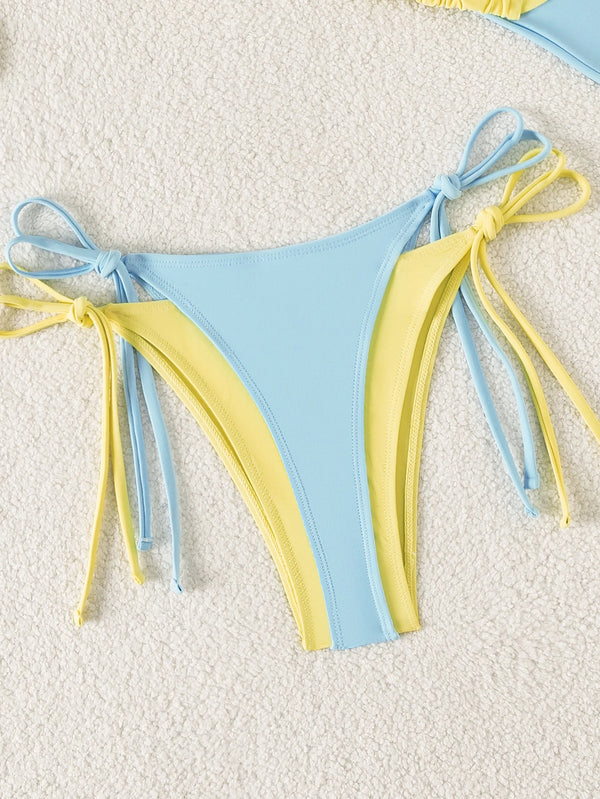 Parte inferior del bikini con doble capa en celeste y amarillo con lazos ajustables