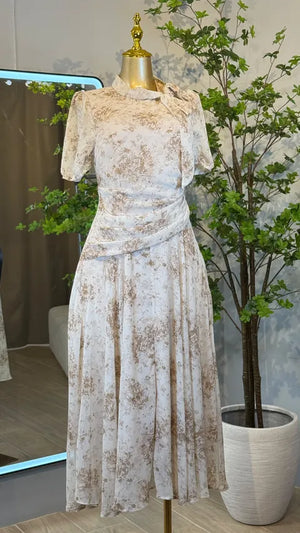 Vestido Midi Floral Elegante Con Lazo Al Cuello