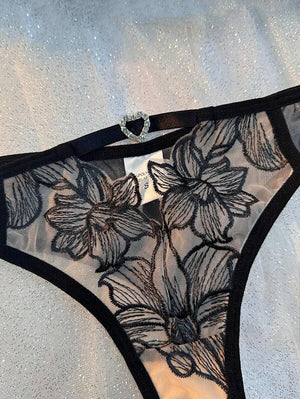 Sujetador negro con aro y tirantes ajustables bordado floral