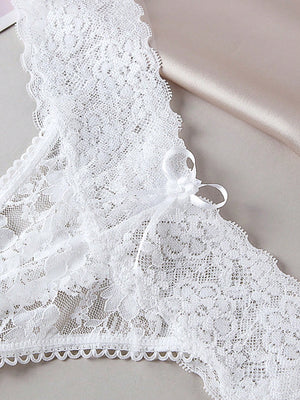 Detalle de encaje del conjunto de lencería blanca de encaje romántico francés