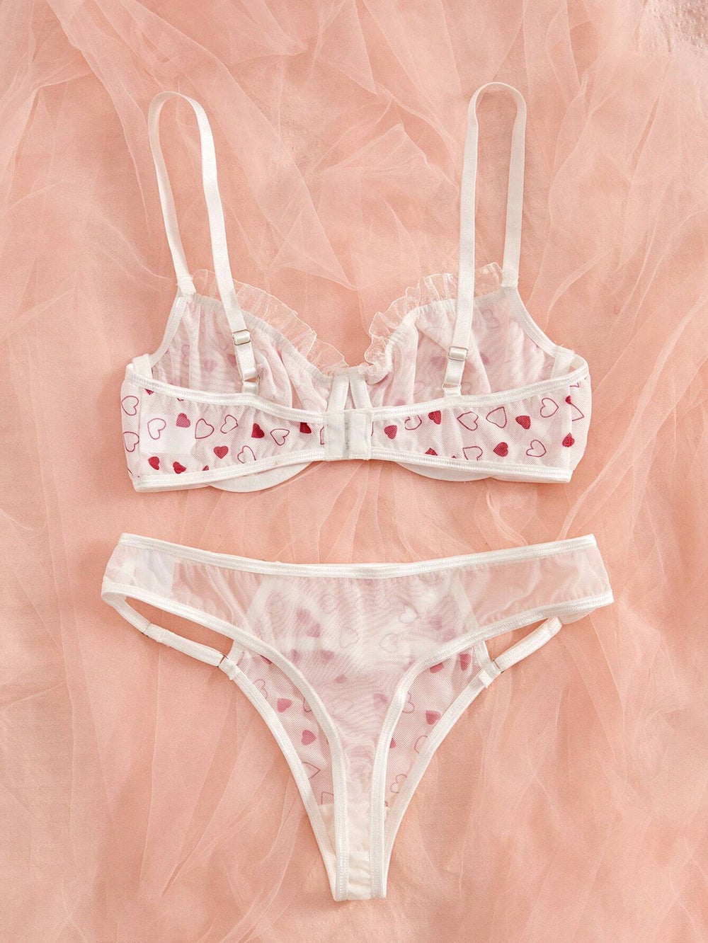 Conjunto Lencería Corazones Rojos transparente con aro vista frontal.
