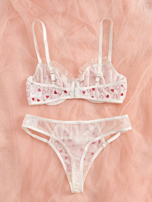 Conjunto Lencería Corazones Rojos transparente con aro vista trasera.
