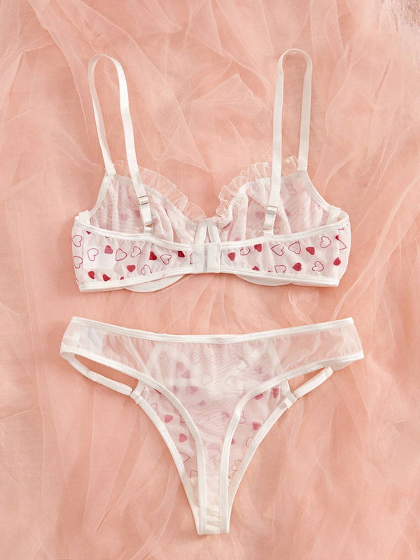 Conjunto Lencería Corazones Rojos transparente con aro vista trasera.
