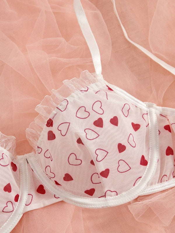 Conjunto Lencería Corazones Rojos transparente con aro detalle volante.