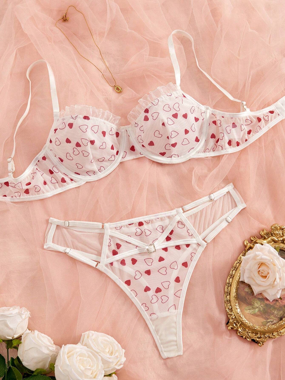 Conjunto Lencería Corazones Rojos transparente con aro vista frontal.
