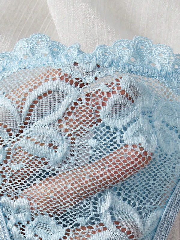 Textura del encaje celeste del conjunto sexy.