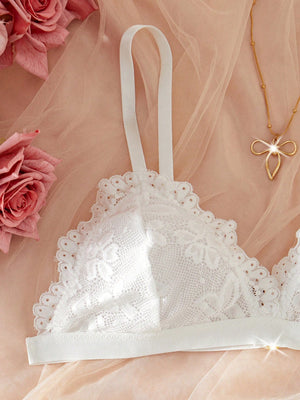 Sujetador blanco de encaje con diseño floral – detalle