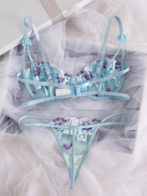 Parte trasera del conjunto sexy de lencería multicolor con tirantes ajustables.