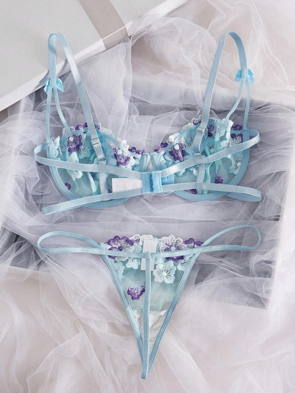 Parte trasera del conjunto sexy de lencería multicolor con tirantes ajustables.