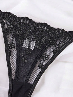 Sujetador negro bordado con tirantes ajustables y encaje