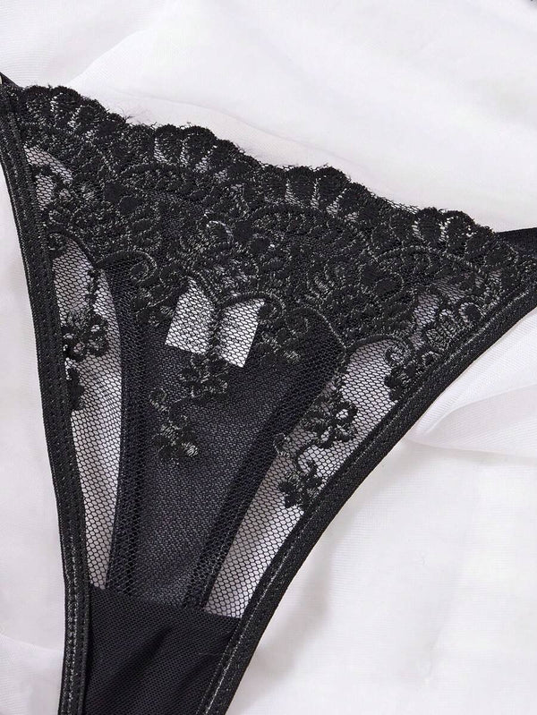 Sujetador negro bordado con tirantes ajustables y encaje