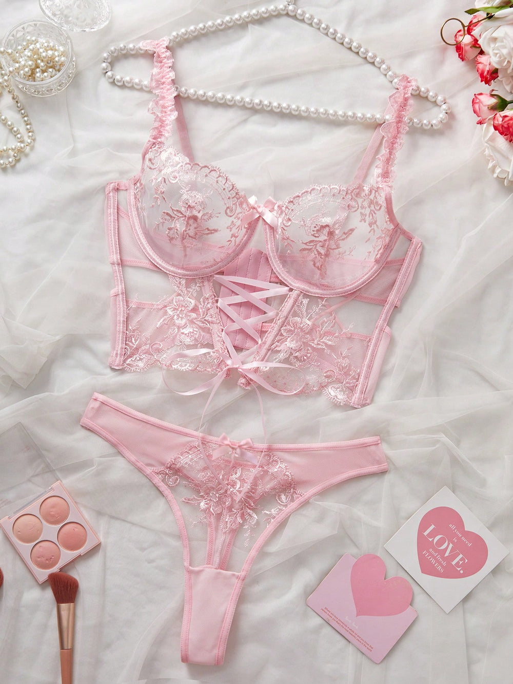 Conjunto de lencería rosa bordada push up romántico vintage vista frontal