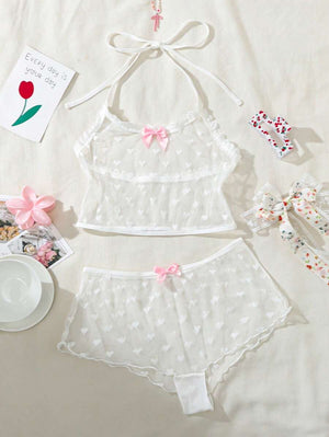 Conjunto transparente blanco con lazo rosa y detalles románticos