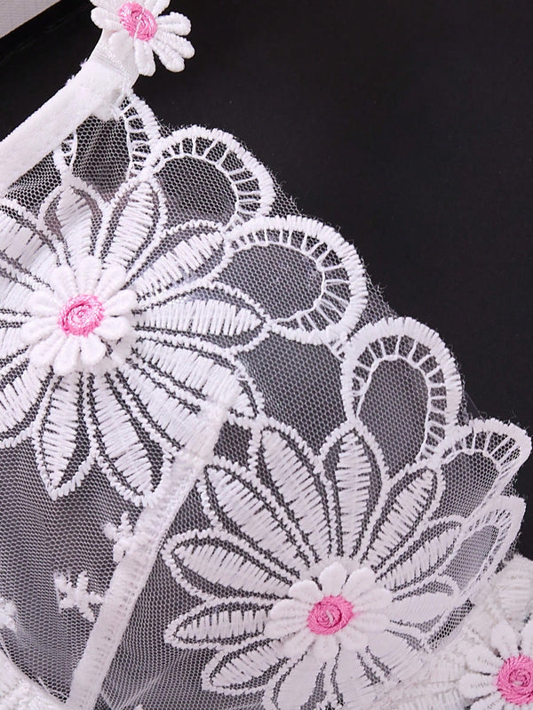 Conjunto lencería blanca bordado floral transparente 2 piezas detalle bordado
