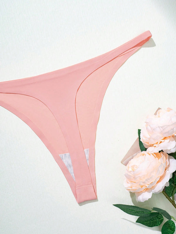 Detalle cercano de tanga rosa del pack tangas invisibles mujer.