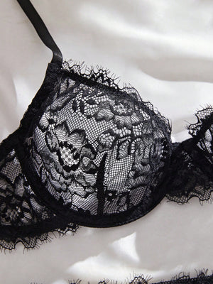 Sujetador lencería encaje negro con aro y push up detalle.
