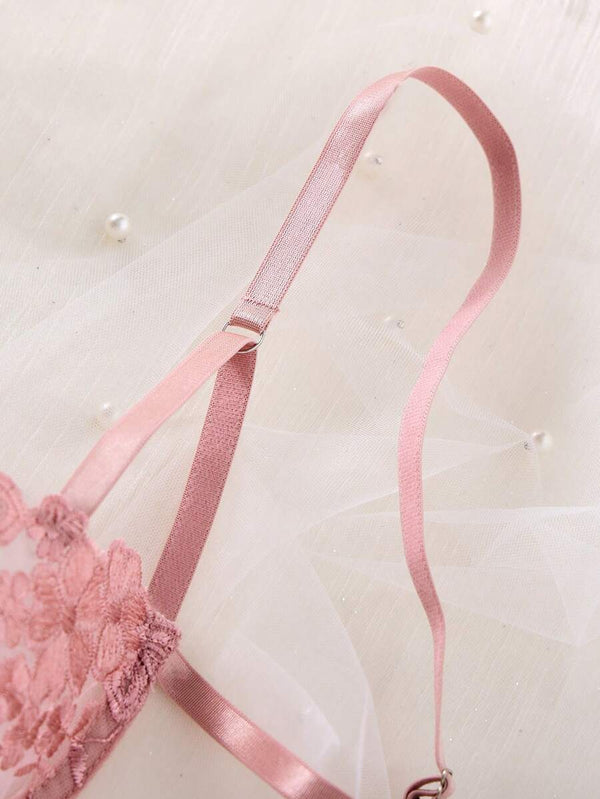 Brasier con varilla y tanga ajustable con lazos en tono rosa empolvado