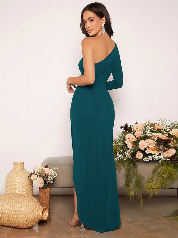 Vestido maxi verde asimétrico envolvente con abertura vista lateral
