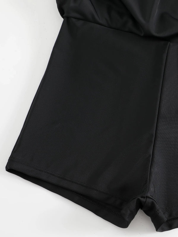 Falda integrada del traje de baño vestido tropical negro