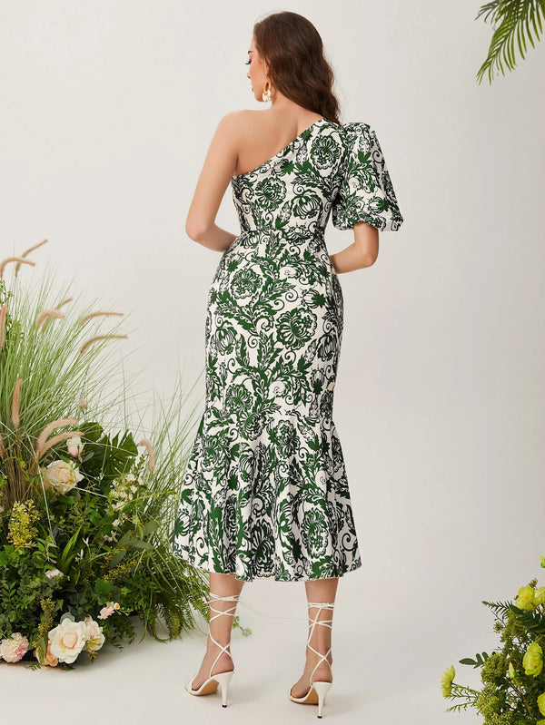 Vestido midi asimétrico verde con estampado floral vista trasera.
