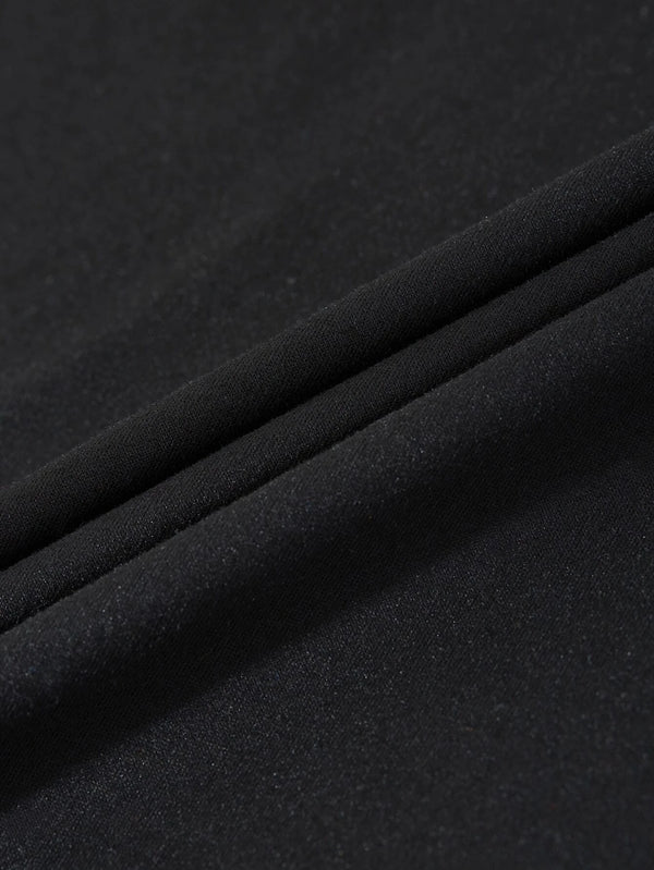 Textura del tejido de la camiseta negra casual.