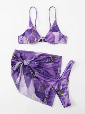 Set bikini multicolor efecto mármol morado detalle de falda pareo
