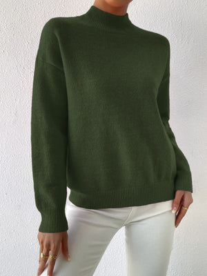 Vista trasera pullover verde mujer