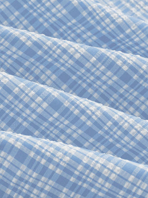 Vestido Corto Azul Y Blanco De Cuadros Con Escote Cuadrado detalle de la tela.