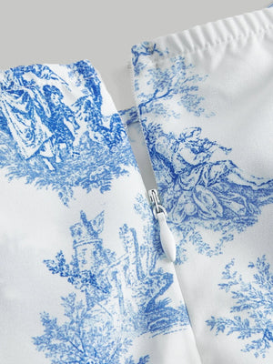 Primer plano de la cremallera del vestido corto azul y blanco con estampado.