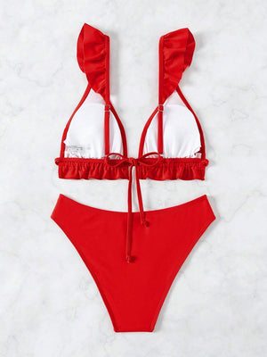 Conjunto completo de bikini rojo con parte inferior de talle alto.