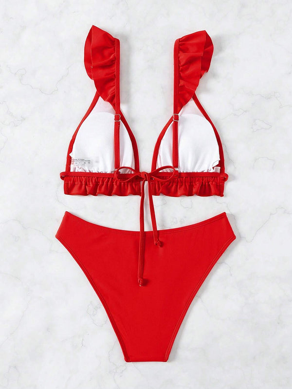 Conjunto completo de bikini rojo con parte inferior de talle alto.
