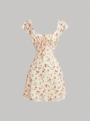 Vestido floral scoop a línea color albaricoque DAKARI
