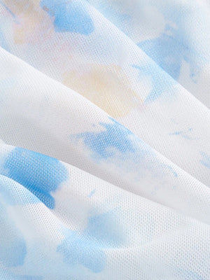 Textura de la tela tricotada azul con estampado floral