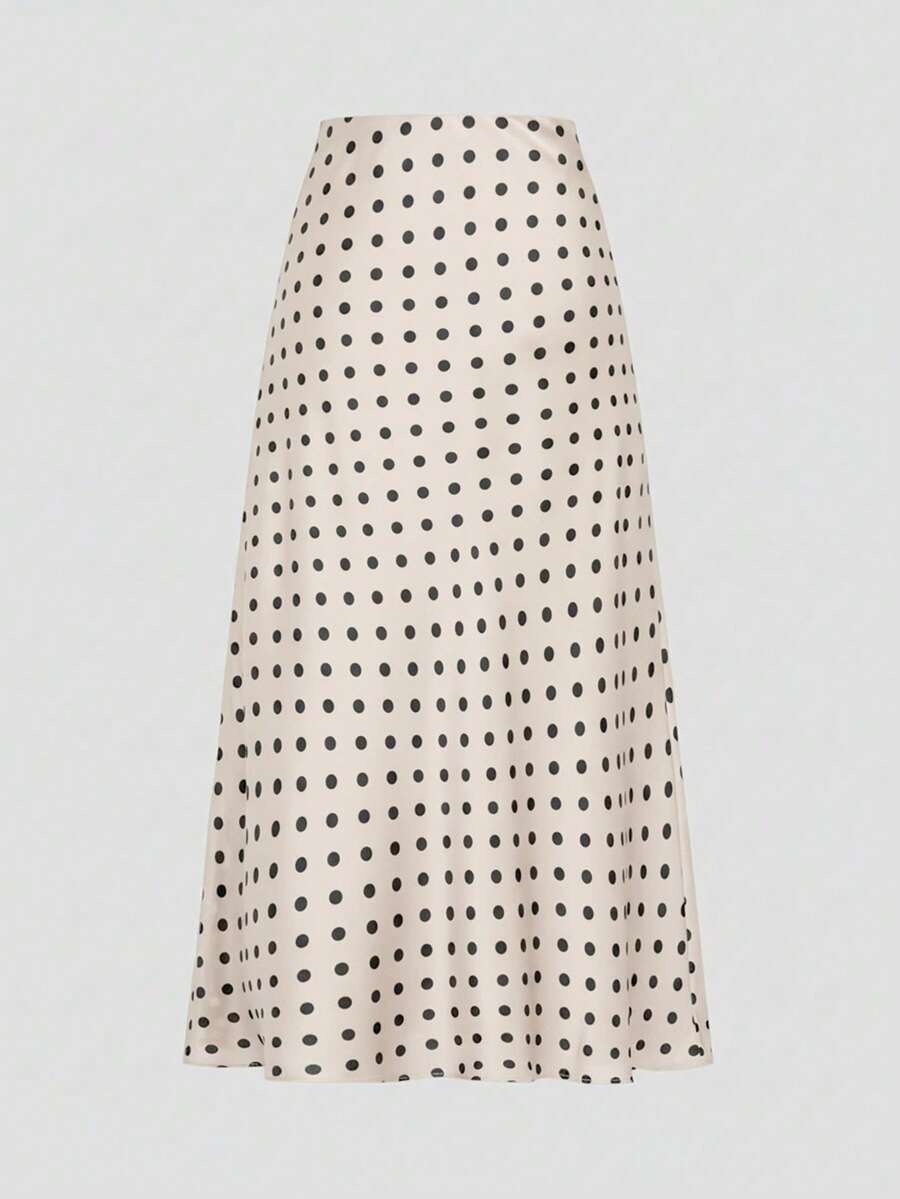 Falda midi color beige con estampado de lunares negros vista frontal.
