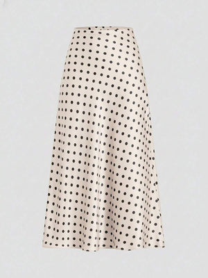 Falda midi color beige con estampado de lunares negros vista frontal.
