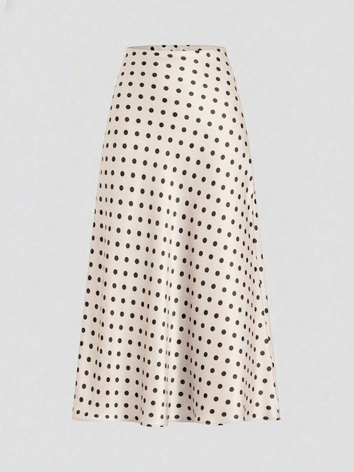 Falda midi color beige con estampado de lunares negros vista frontal.
