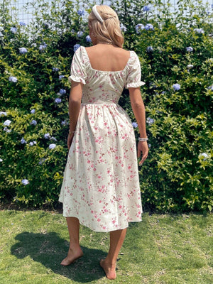 Vestido midi bohemio con corset rosa
