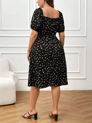 Vista trasera del vestido midi con estampado floral de margaritas.