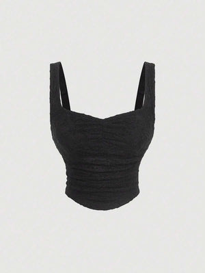 Top del set elegante negro con tirantes y frunces