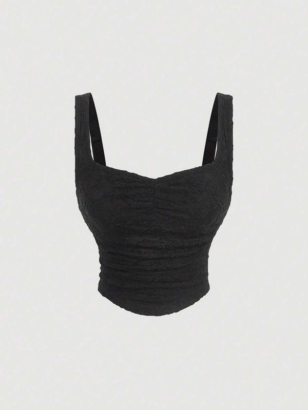 Top del set elegante negro con tirantes y frunces