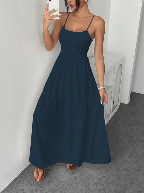 Vestido largo azul marino de tirantes finos con volantes