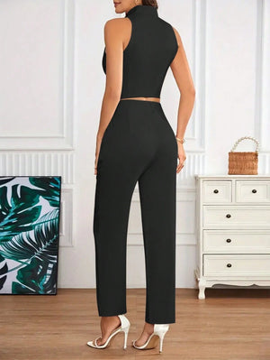 Vista trasera conjunto elegante negro con top y pantalón