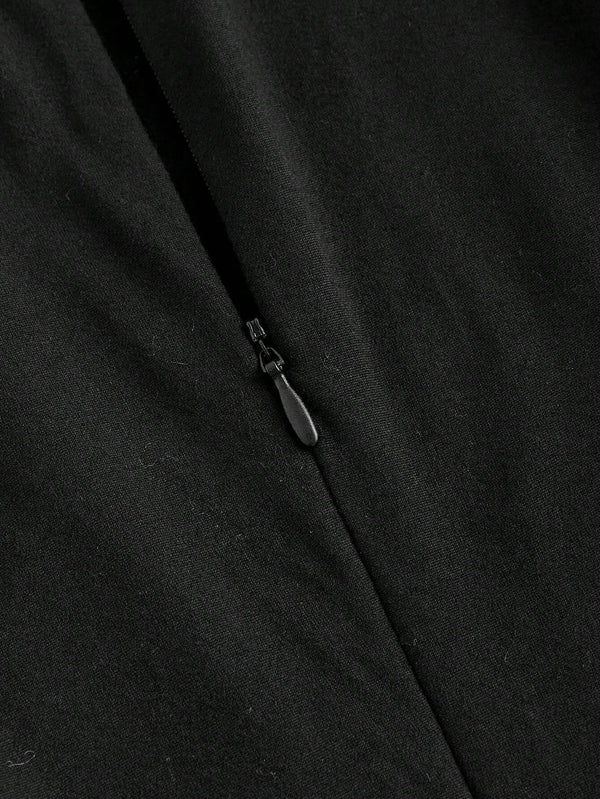 Cierre con cremallera del jumpsuit negro elegante