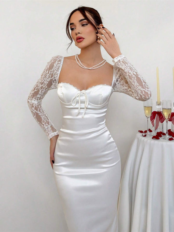 Vestido blanco elegante para boda con mangas de encaje.