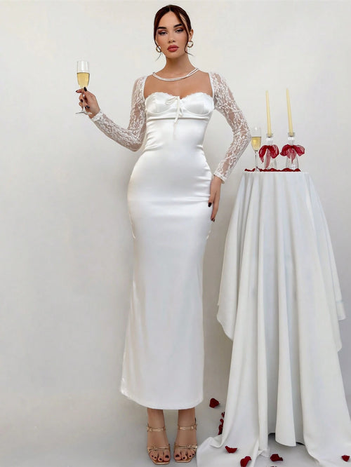 Vestido blanco elegante para boda de satén con encaje.
