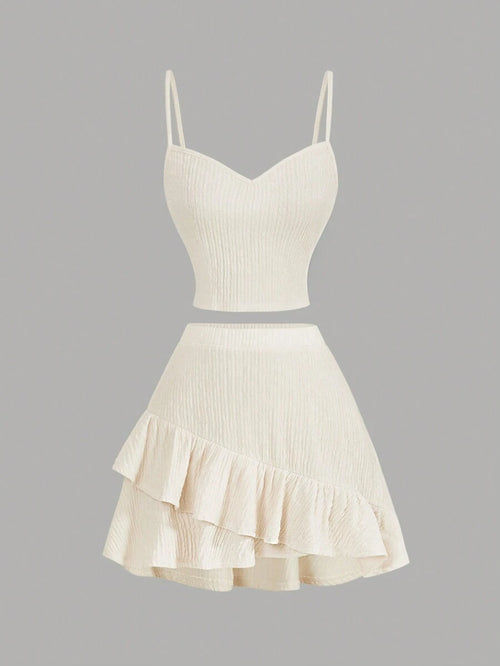 Conjunto crop albaricoque con top de tirantes y falda asimétrica - vista frontal.
