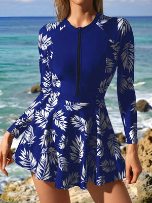 Vestido De Baño Azul Con Estampado Tropical Y Cremallera con cierre frontal.
