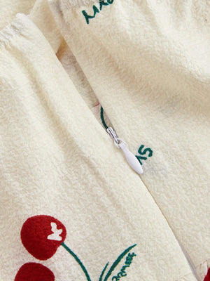 Detalle de Enterizo Corto Albaricoque Con Estampado De Cereza
